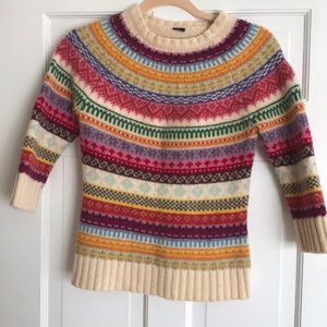 100% lambs wool will fit a Xs to small